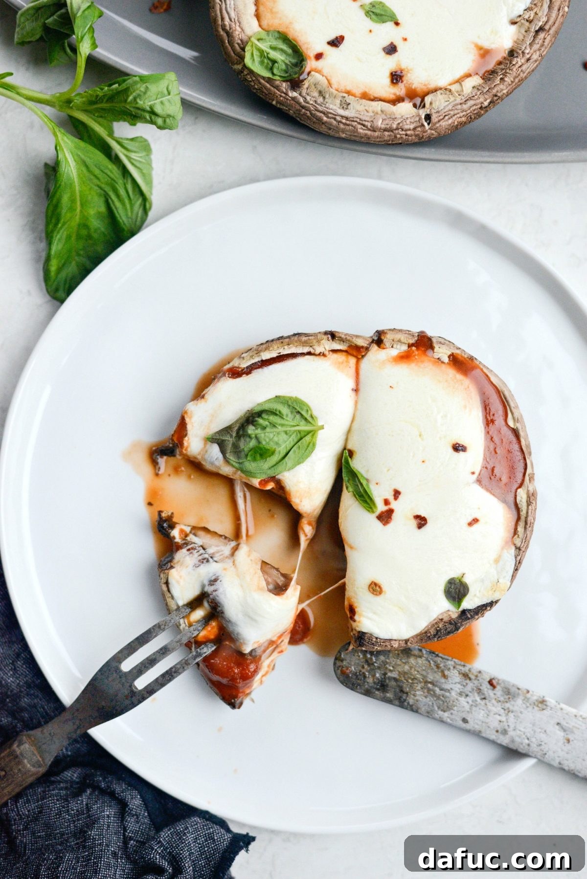 25+ Simple Dinners for Busy Weeknights 5 Roasted Caprese Portobello Mushrooms, a delightful meatless option for dinner.