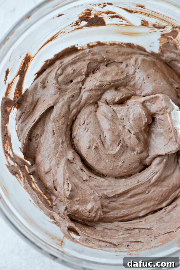 Blissful No-Churn Hash Indulgence 14 Chocolate and whipped cream mixture after folding, ready for mix-ins