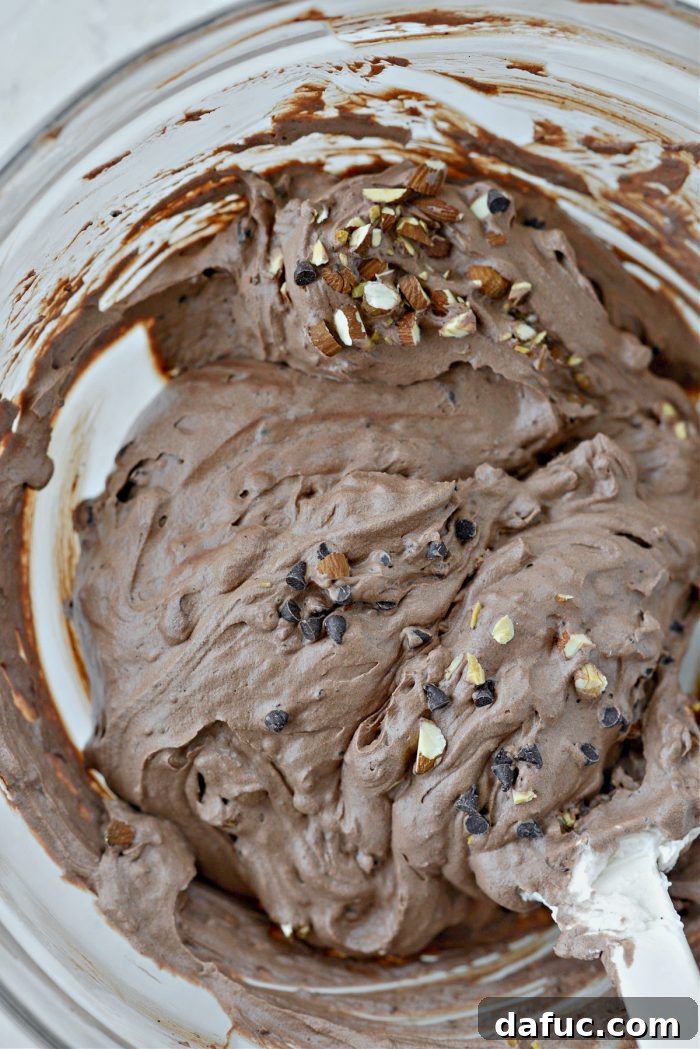 Blissful No-Churn Hash Indulgence 16 Mini chocolate chips and toasted almonds stirred into the ice cream base