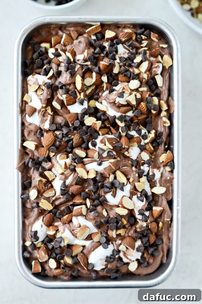 Blissful No-Churn Hash Indulgence 20 Sprinkling the top of the ice cream with reserved chocolate chips and roasted almonds