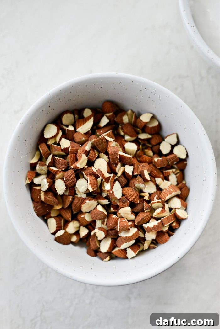Blissful No-Churn Hash Indulgence 5 Toasted chopped almonds on a baking sheet