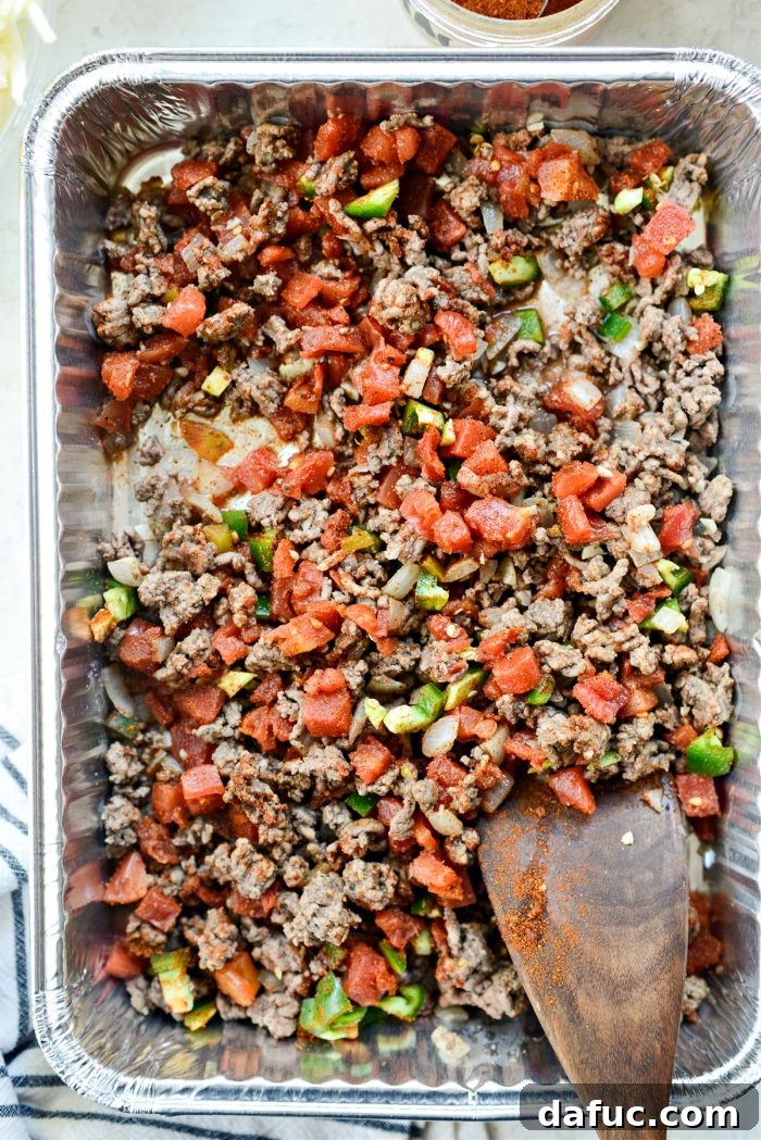 Irresistible Smoked Chile Queso 11 Stir to combine