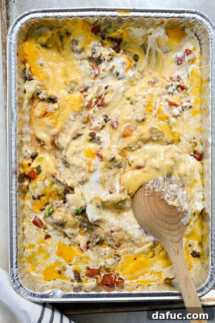 Irresistible Smoked Chile Queso 24 stirring dip