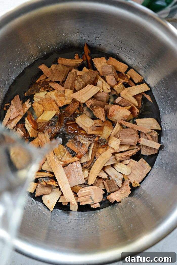 Irresistible Smoked Chile Queso 5 apple wood chips soaking in water