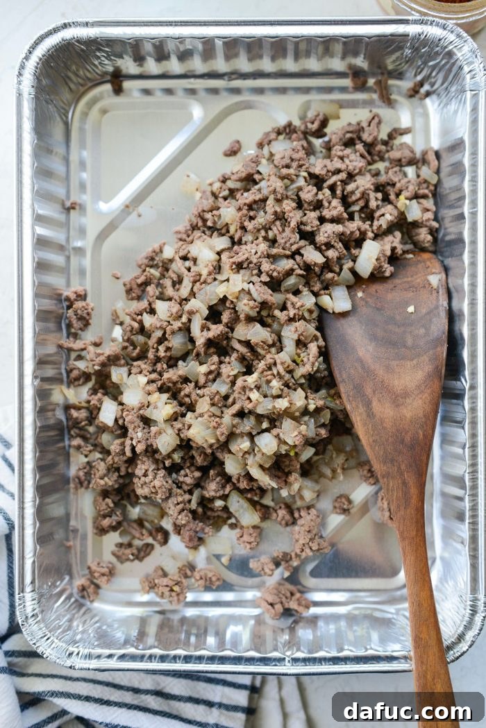 Irresistible Smoked Chile Queso 8 add mixture to a disposable pan