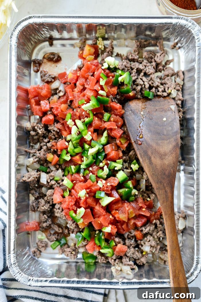 Irresistible Smoked Chile Queso 9 add tomatoes with green chiles and jalapeno