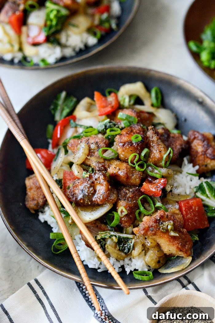 Close-up of Black Pepper Chicken Stir-fry with vibrant vegetables