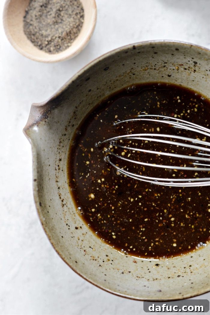 Whisked black pepper sauce in a bowl