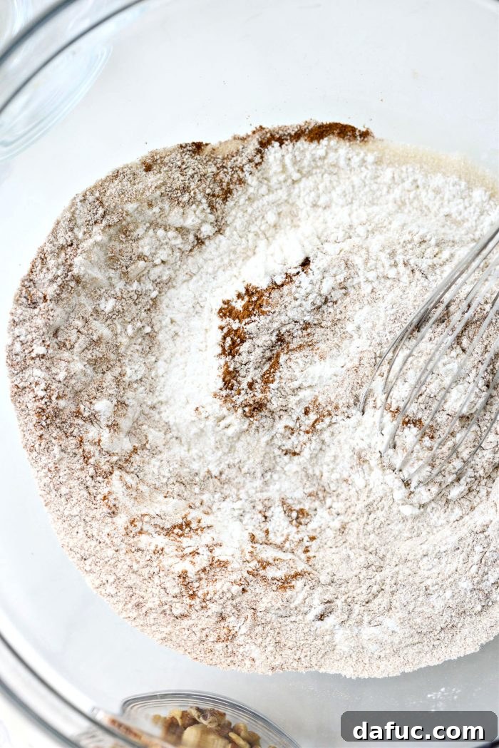 Effortless Cranberry Walnut Loaf 6 Whisked dry ingredients for bread in a mixing bowl