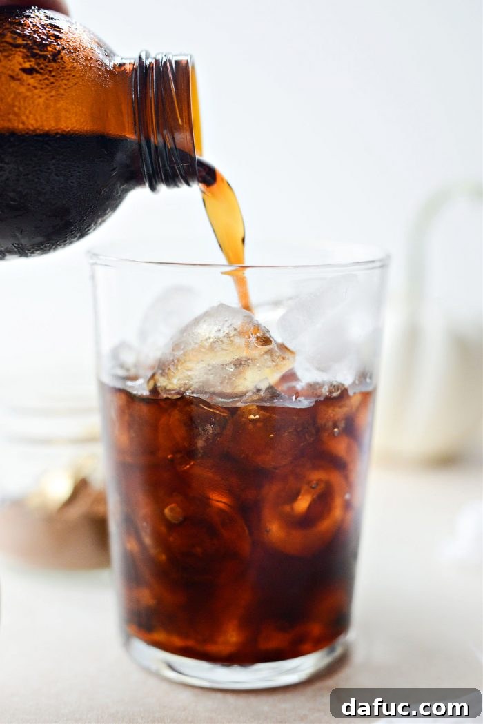 Fall's Creamy Pumpkin Brew 11 Adding ice and cold brew coffee to glass