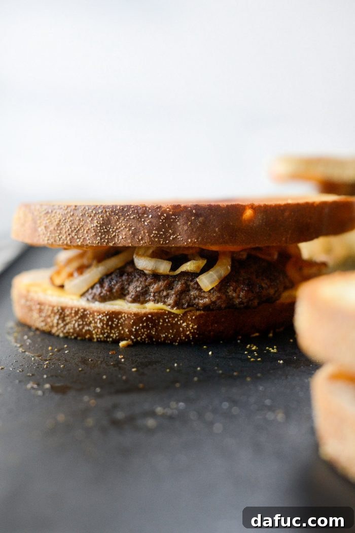 The Ultimate Beef Patty Melt 17 Finished Classic Beef Patty Melts, golden brown and perfectly cheesy, fresh off the griddle