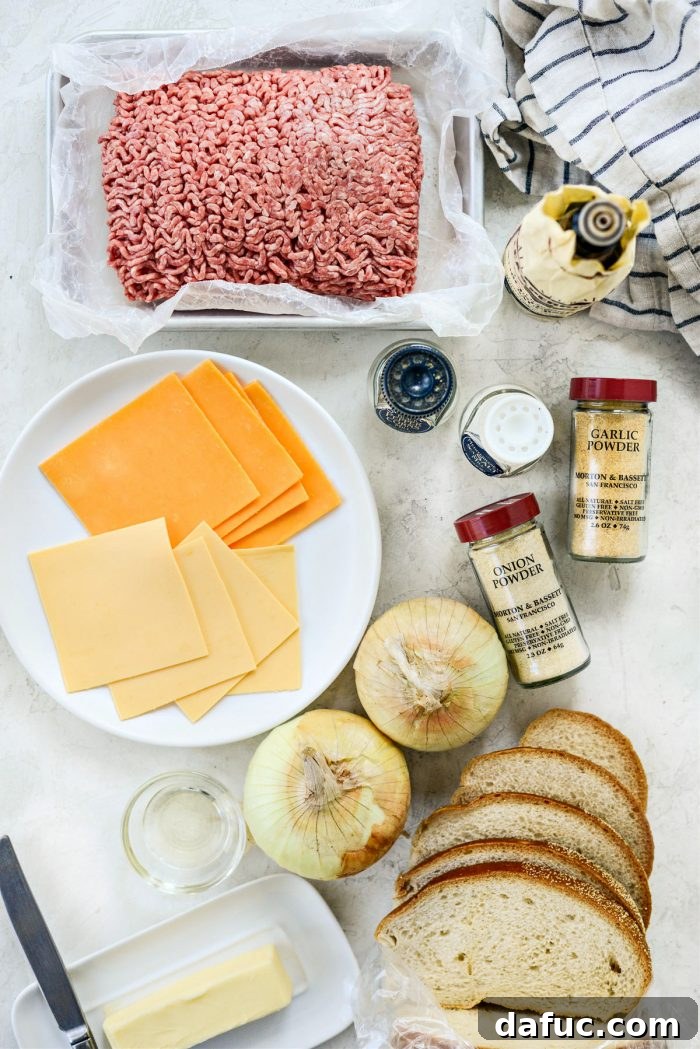The Ultimate Beef Patty Melt 4 All ingredients for Classic Beef Patty Melt laid out: ground beef, onions, bread, cheese, butter, various seasonings, and Worcestershire sauce