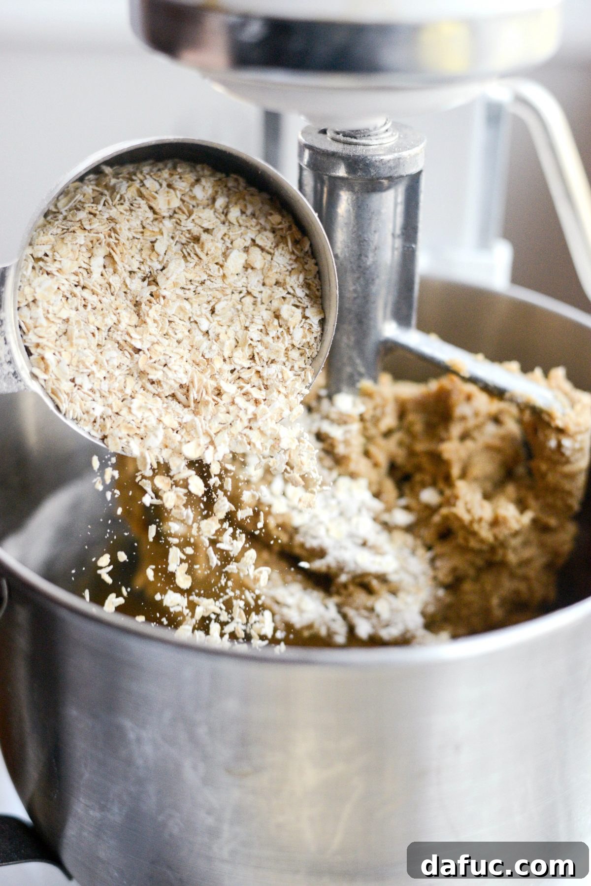 Golden Toffee Oatmeal Chocolate Chip Cookies 14 Incorporating quick oats into the cookie dough, creating a thick and hearty mixture.