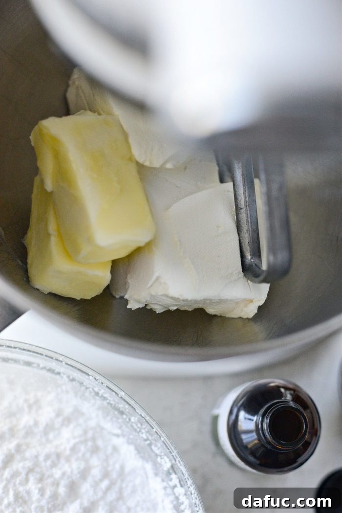 Dark Velvet Delights 18 softened butter and cream cheese in bowl of mixer