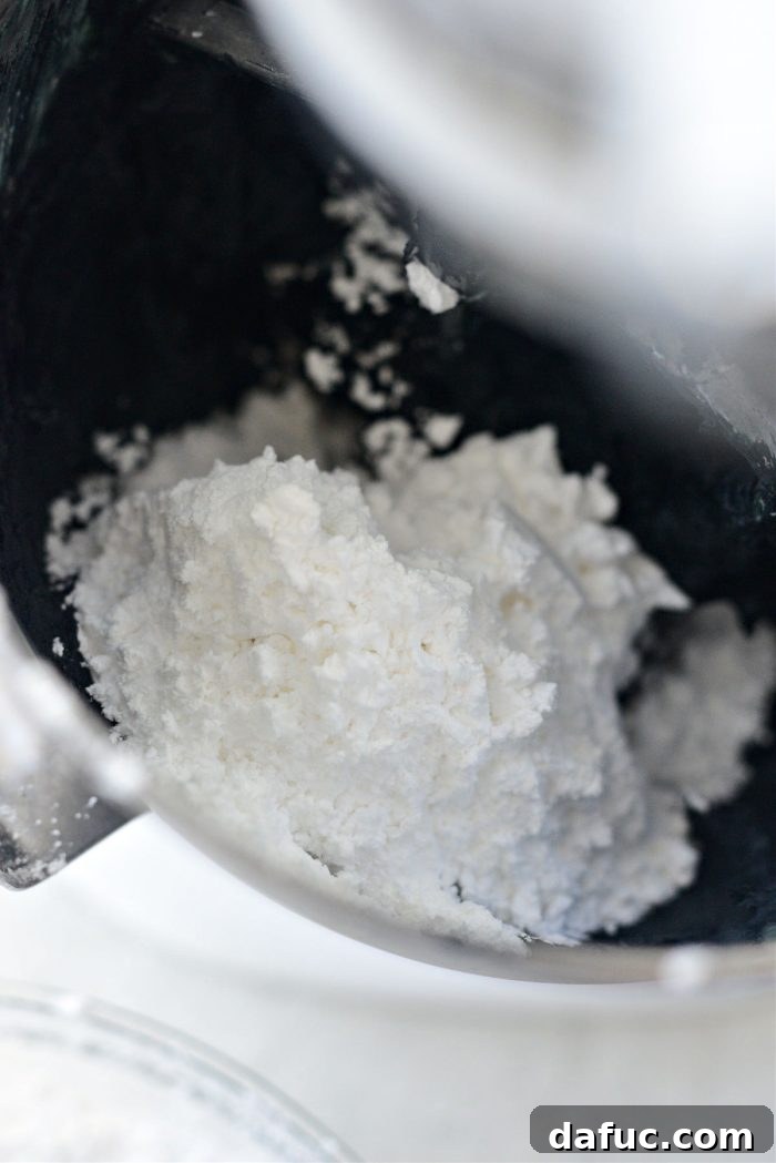 Dark Velvet Delights 21 add in small amounts of sifted powdered sugar