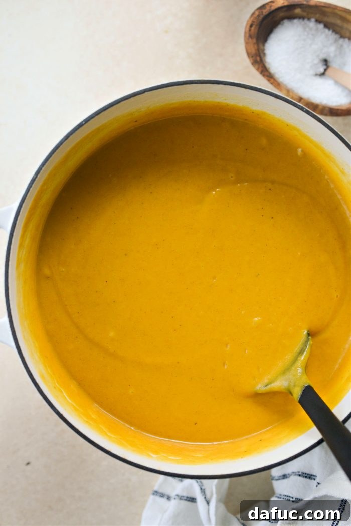 smooth and velvety Roasted Sweet Potato Squash Soup