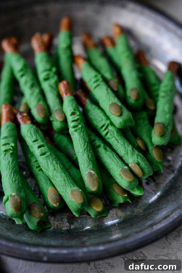 Ghoulish Grabbers 13 A final close-up of a plate of perfectly set witch finger pretzels, ready for serving.