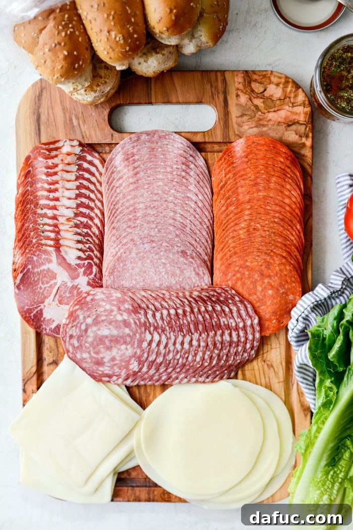 Zesty Italian Heroes 4 italian meats and cheeses on wood cutting board