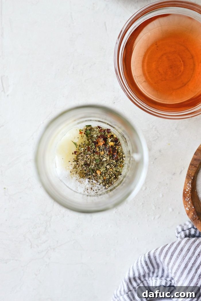 Zesty Italian Heroes 6 garlic, italian seasoning, salt, pepper and red pepper flakes in a glass jar.