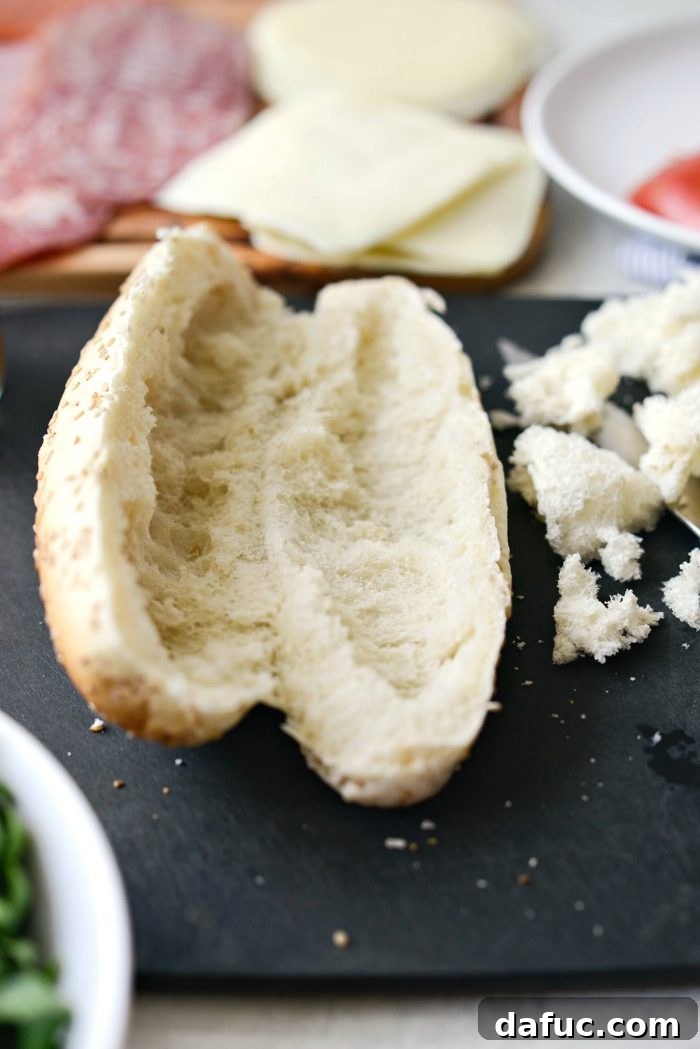 Zesty Italian Heroes 10 bread removed from center of sub bun