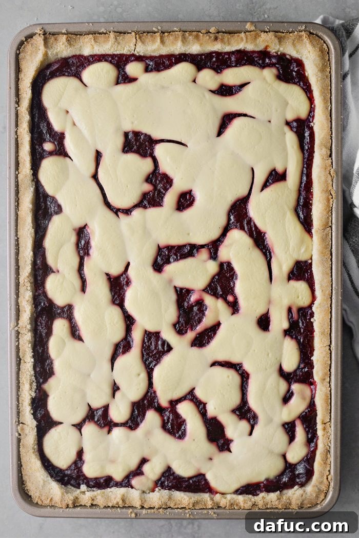 Crimson Kitchen 17 The fully baked Cranberry Küchen, golden brown on the edges with a set and slightly browned sour cream topping.