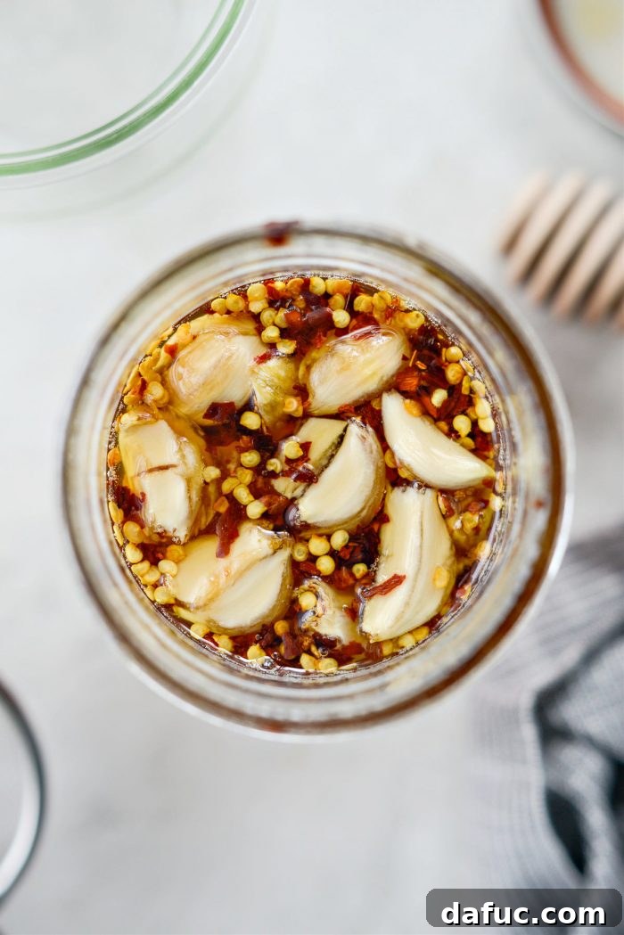 Sweet Heat Garlic Honey 11 Daily agitation of the Garlic Hot Honey jar