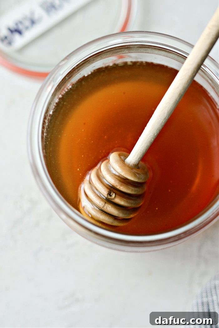 Sweet Heat Garlic Honey 18 Garlic Hot Honey drizzled over food