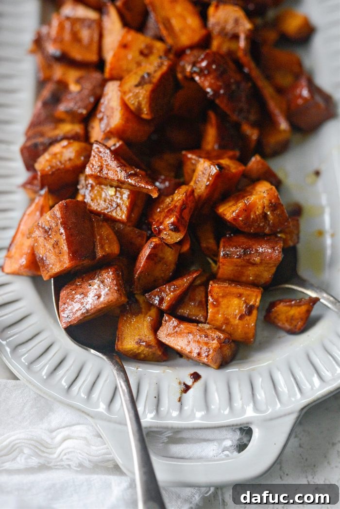 The final delicious serving of Cinnamon Roasted Hot Honey Sweet Potatoes on a plate