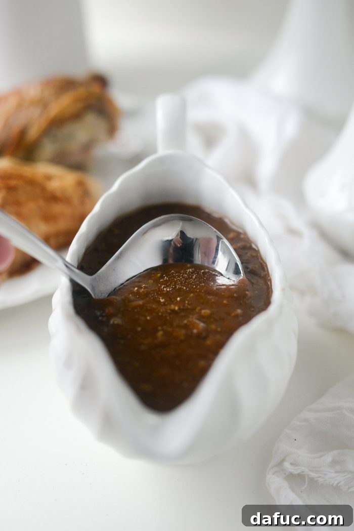 Rich homemade giblet gravy served in a elegant gravy boat