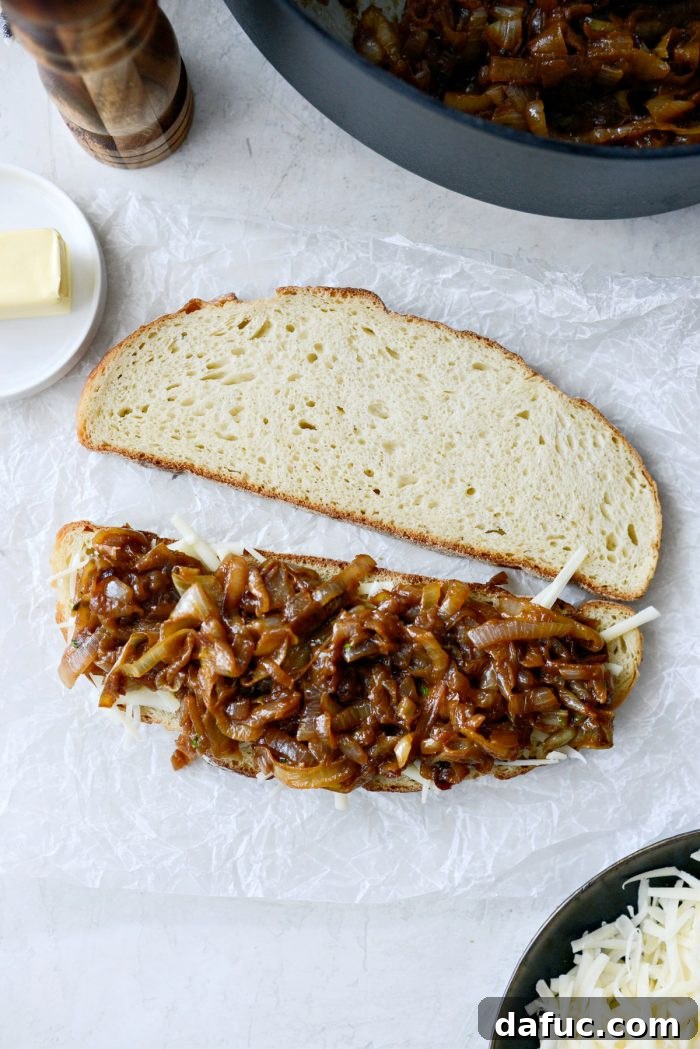 Looking down onto caramelized onion and Gruyère topped sourdough