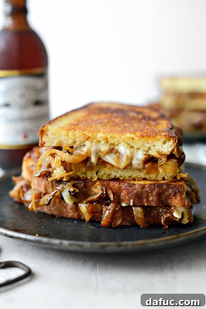 French Onion Soup Grilled Cheese Sandwich sliced and ready to eat