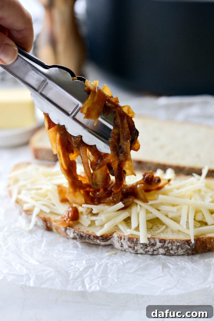 Topping Gruyère cheese with caramelized onions