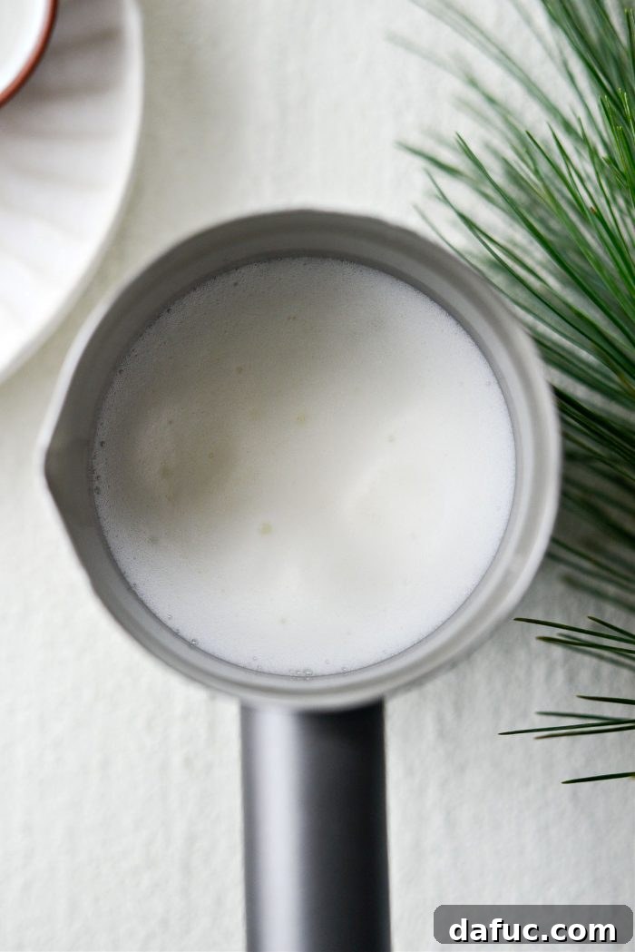 Frothed milk ready to pour