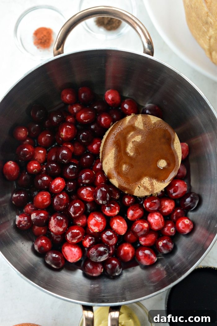 Glistening Cranberry Glazed Ham 6 cranberries, brown sugar, maple syrup and orange juice