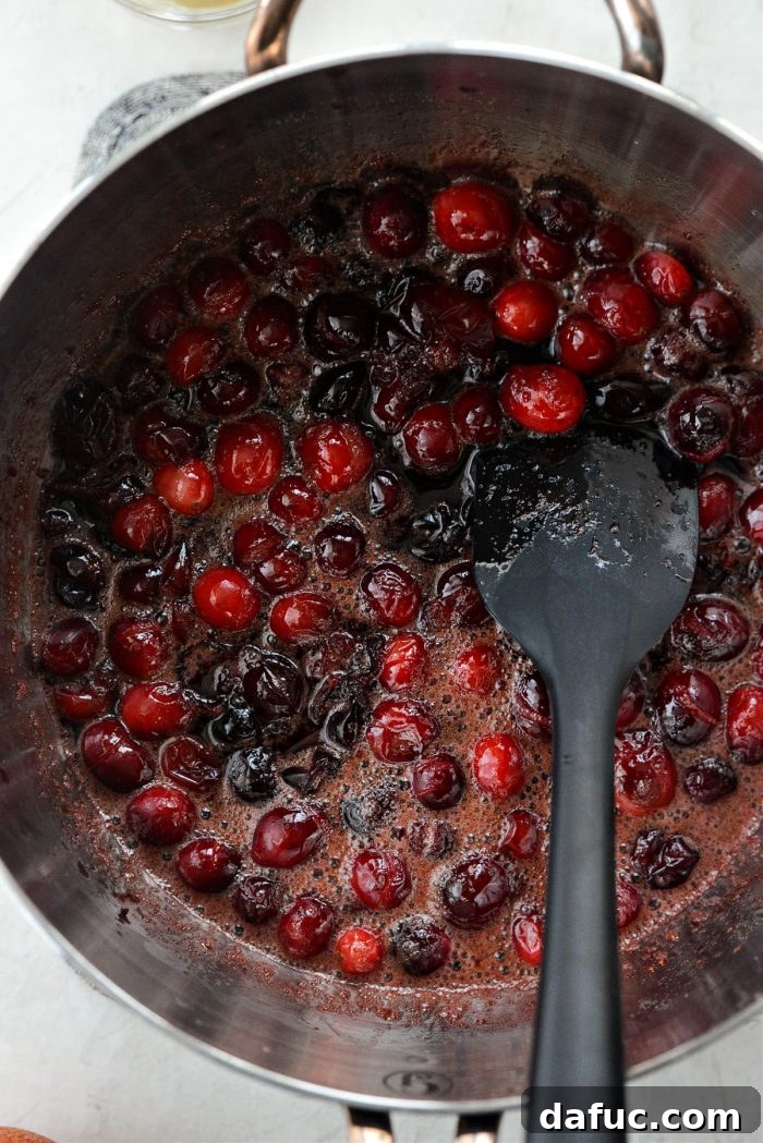 Glistening Cranberry Glazed Ham 8 remove off heat when cranberries burst