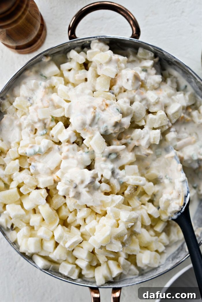 Mel's Golden Cheesy Potato Bake 11 Gently mix until combined
