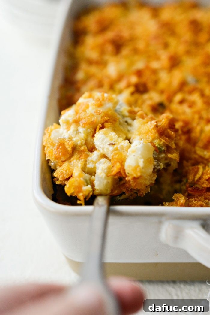 Mel's Ultimate Cheesy Potato Bake 3 A close-up of Mel's Cheesy Potatoes, showcasing the rich texture and golden-brown perfection.