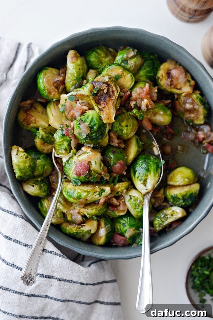 Decadent Maple Bourbon Bacon Brussels 17 Finished Maple Bourbon Bacon Brussels Sprouts garnished with fresh parsley.
