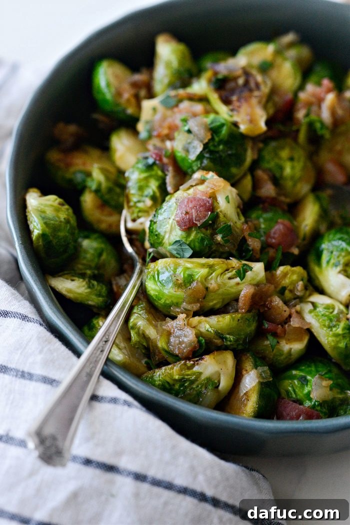Decadent Maple Bourbon Bacon Brussels 18 Maple Bourbon Bacon Brussels Sprouts served in a rustic bowl.