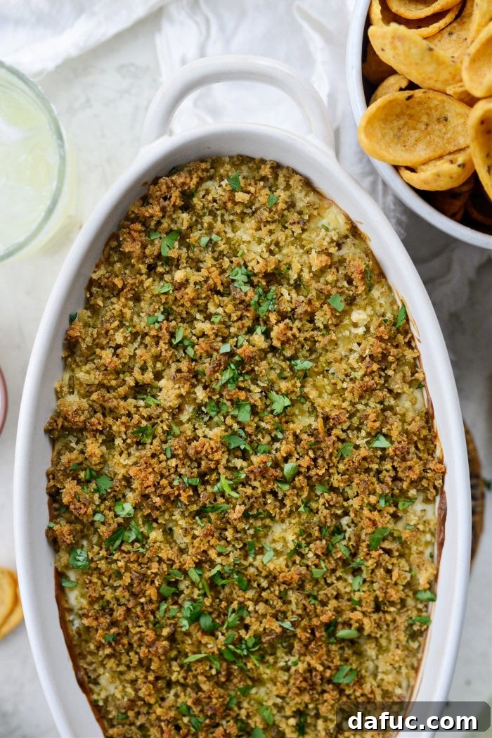 The Ultimate Jalapeño Popper Dip 2 Warm and cheesy Jalapeño Popper Dip served with corn chips