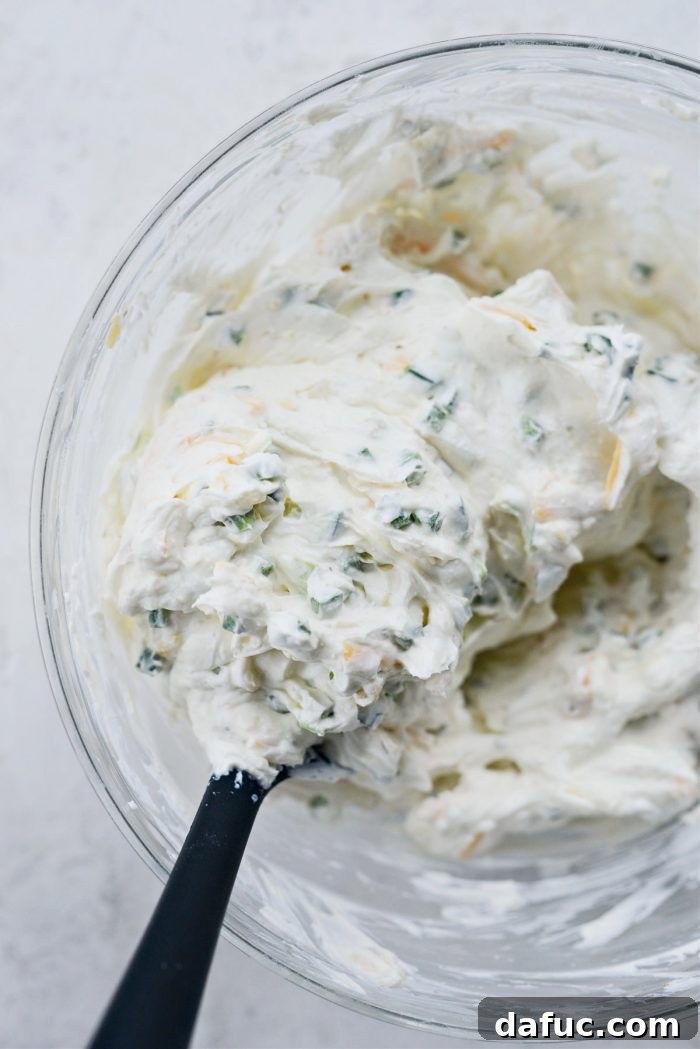 The Ultimate Jalapeño Popper Dip 9 Dip mixture fully combined and ready for baking dish
