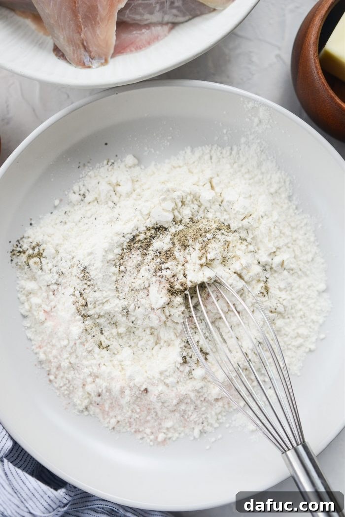 Pan-Seared Perch with Lemon Brown Butter 5 Seasoning flour with salt and pepper in a bowl