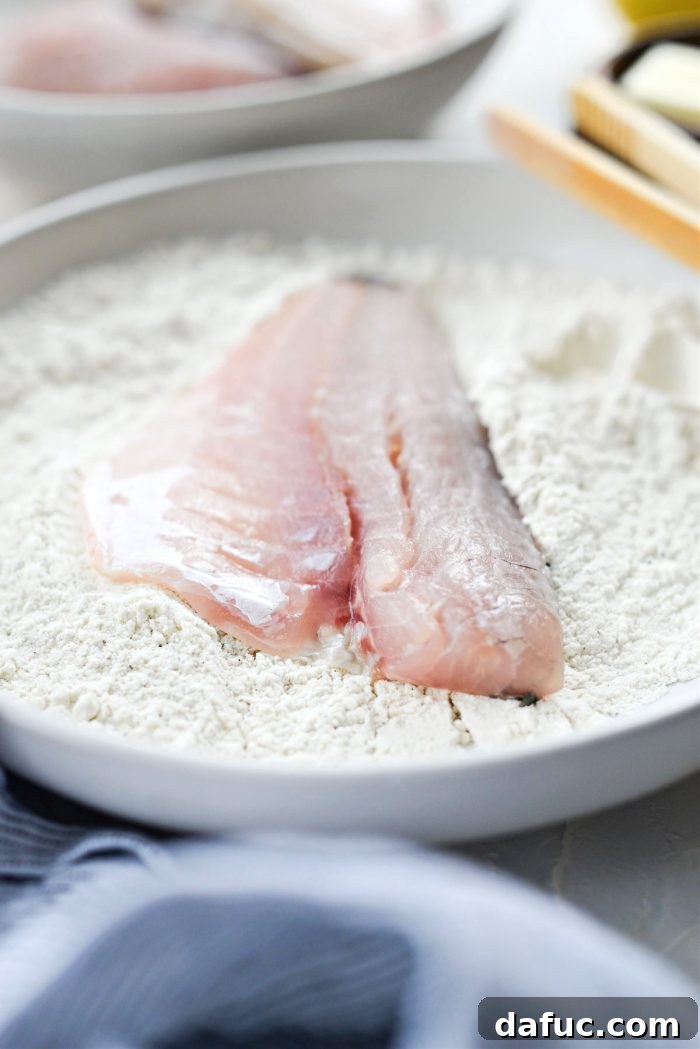 Pan-Seared Perch with Lemon Brown Butter 7 Dredging fish in flour mixture