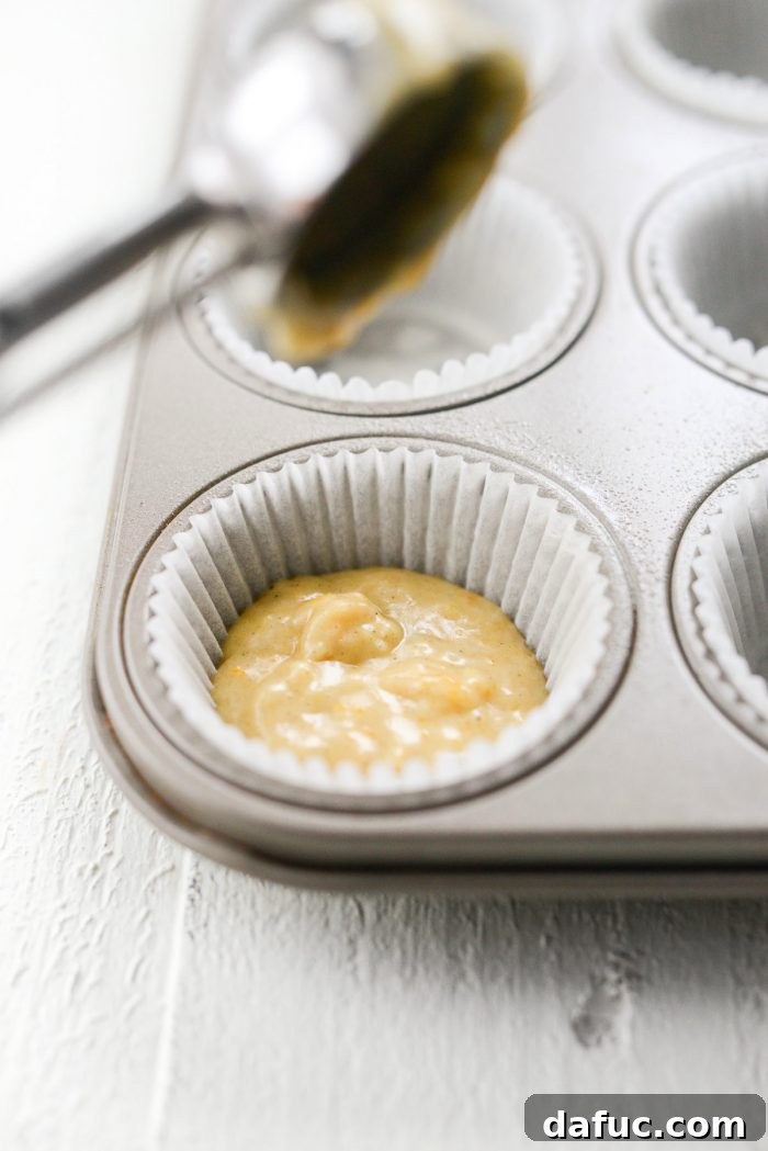 Fragrant Orange Cardamom Gems 15 Muffin batter divided evenly into lined muffin pan