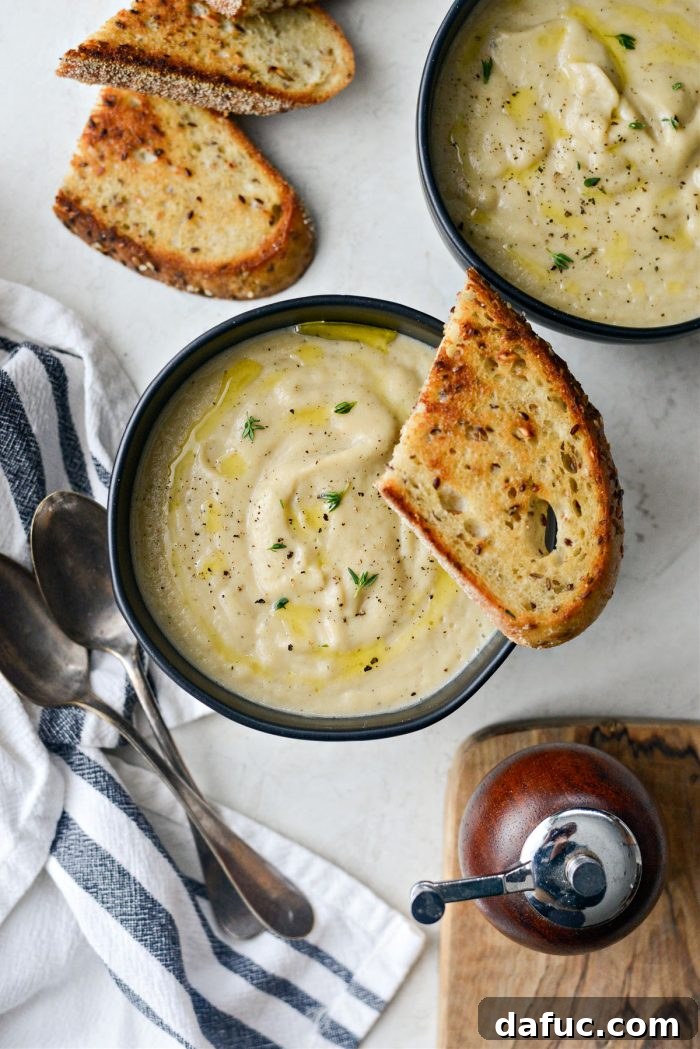 Golden Roasted Parsnip Puree 18 A beautifully presented bowl of Creamy Roasted Parsnip Soup, ready to be enjoyed.
