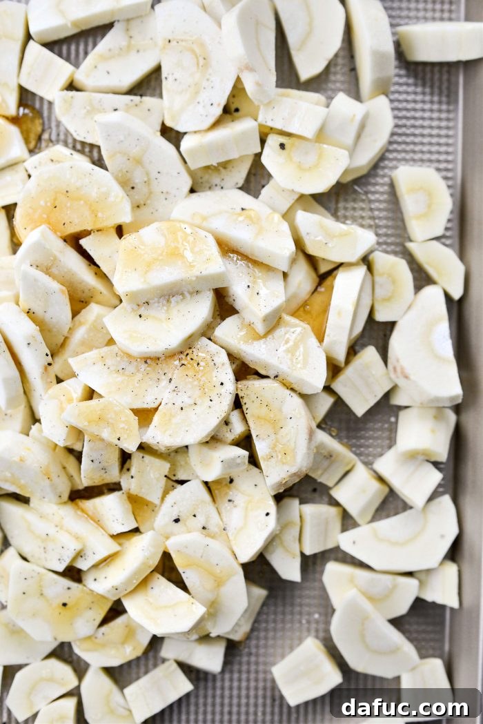 Golden Roasted Parsnip Puree 6 Drizzling olive oil and honey over chopped parsnips, seasoned with salt and pepper.