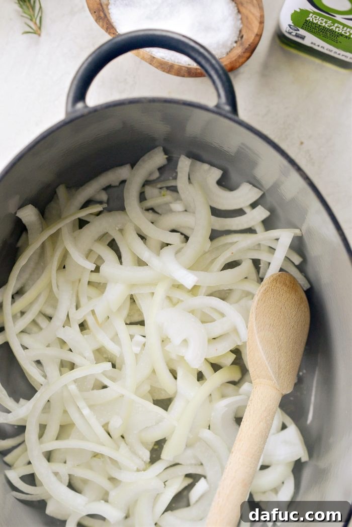 Golden Roasted Parsnip Puree 10 Sliced yellow onions sautéing in a Dutch oven with olive oil and a pinch of salt.