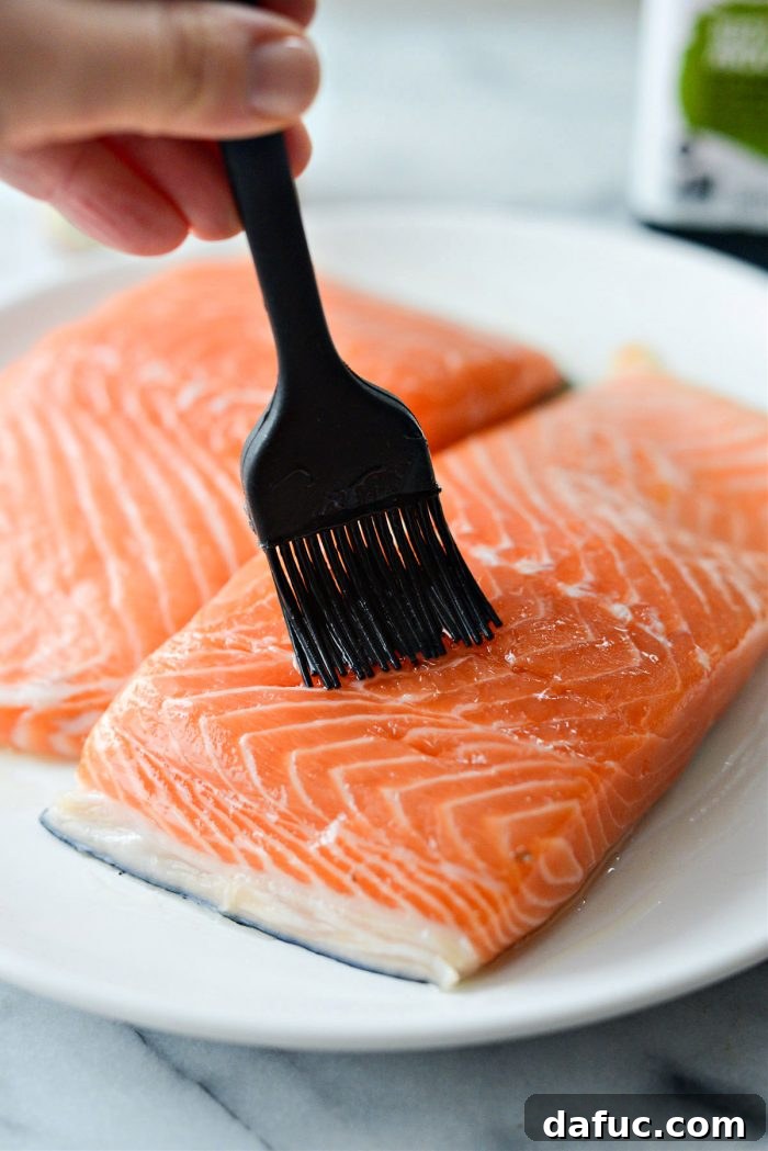 Spicy Salmon Street Tacos 11 Brushing salmon fillets with oil before seasoning