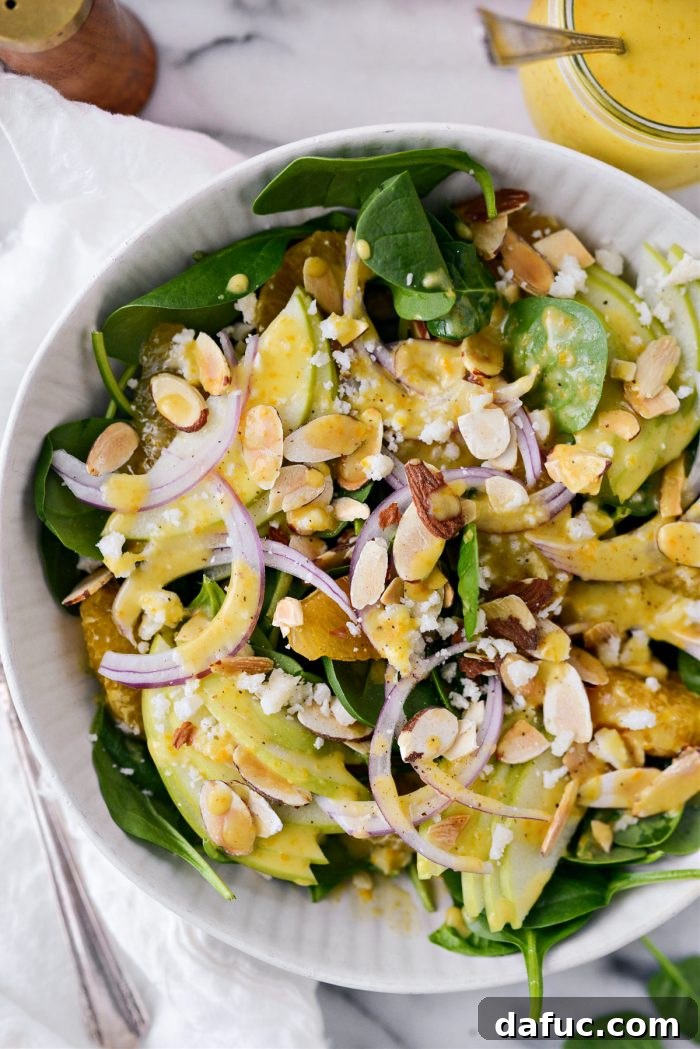 Citrus Vinaigrette drizzled over a spinach salad