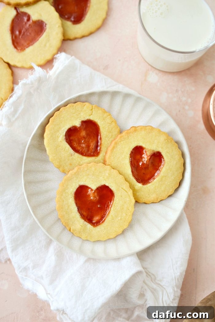 Jam Filled Butter Heart Cookies 20 A beautifully arranged platter of Jam Heart Butter Cookies, showcasing their variety and inviting presentation.